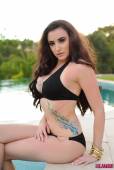 Harriet H Bursting Out Of Her Black Bikini d6vmm9tk1g