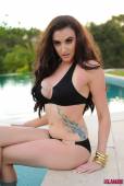 Harriet H Bursting Out Of Her Black Bikini t6vmmjbx6m