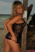 Michelle Cole Just In Her Tight Fishnet Bodysuit On The Beach t6vna4mjkw