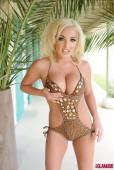 Dannie Aston Stripping From Her Brown Swimsuit h6vqw1phgw