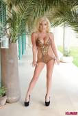 Dannie Aston Stripping From Her Brown Swimsuit-b6vqw163v5.jpg