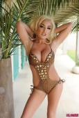 Dannie Aston Stripping From Her Brown Swimsuit y6vqw2ui0m