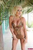 Dannie Aston Stripping From Her Brown Swimsuit g6vqw1kmh4
