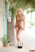 Dannie Aston Stripping From Her Brown Swimsuit a6vqw1x5mf