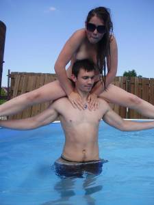 A young couple playng in the pool [x37]-v6x2ht2ihq.jpg