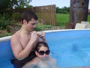 A young couple playng in the pool [x37] 56x2hsluvx