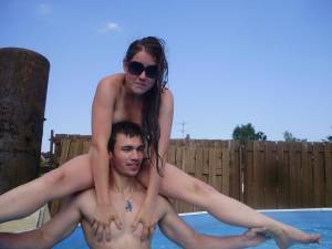 A young couple playng in the pool [x37] 46x2ht1okd