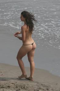 Topless girl goes full-nudist at textile beach  Almeria (Spain)-e6x555e3ck.jpg