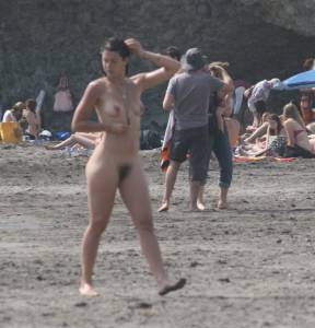 Topless girl goes full-nudist at textile beach  Almeria (Spain)a6x556nem4.jpg