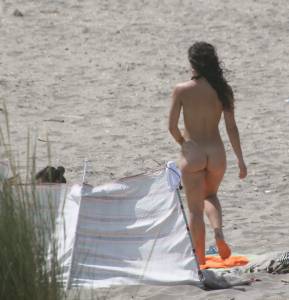 Topless girl goes full-nudist at textile beach  Almeria (Spain)-a6x556gftu.jpg