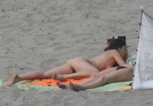 Topless girl goes full-nudist at textile beach  Almeria (Spain)-56x556uztm.jpg