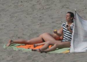 Topless girl goes full-nudist at textile beach  Almeria (Spain)i6x556selt.jpg