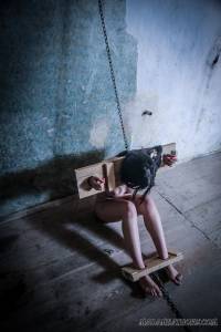 Young-nude-slave-waiting-shackled-in-the-dungeon-o6xk3vvovv.jpg