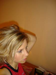Blonde-playing-and-making-photos-at-home-x206-b7bhcdimpp.jpg