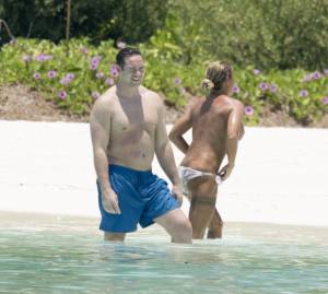 Katie Price Topless On A Beach In Miami-27b4h8migx.jpg