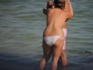 A Topless MILF With Her Husband on the Beach-n7bnm1izso.jpg