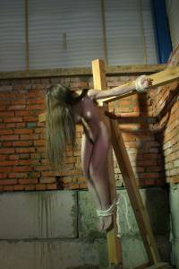 Crucified Brunette Girl-m7brisgm7f.jpg